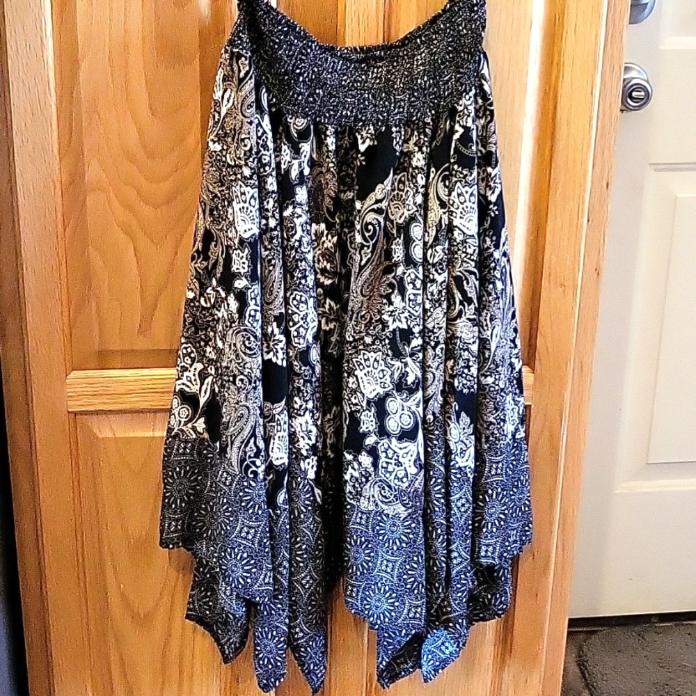 Beautiful Hazel skirt with deep sharkbite hem.